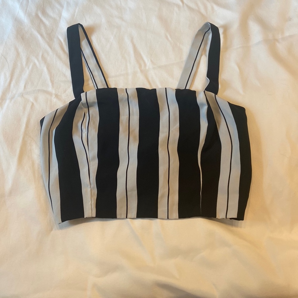 White and black striped Charlotte Russe crop top w tie in back. Size Small.